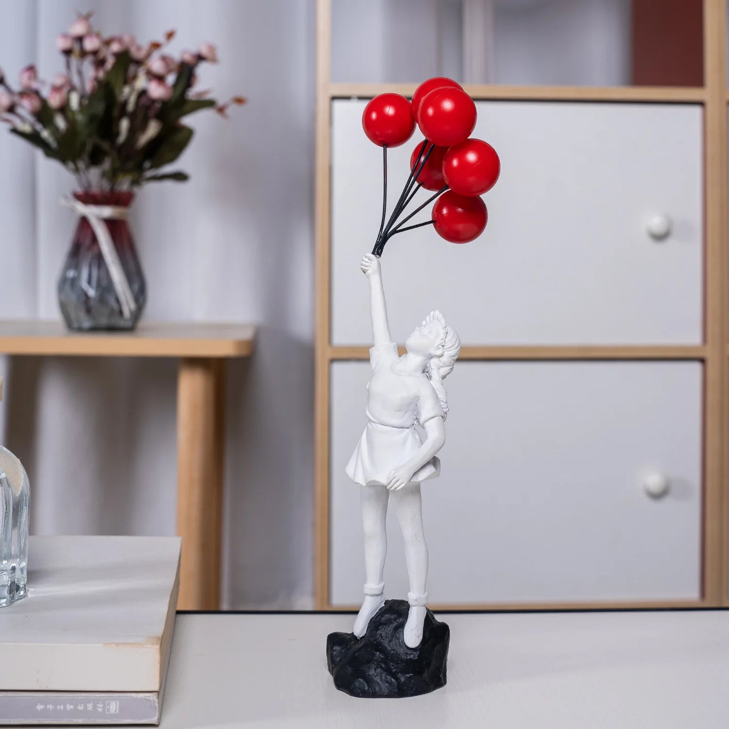 Lifted Grace: Modern Balloon Girl Figurine